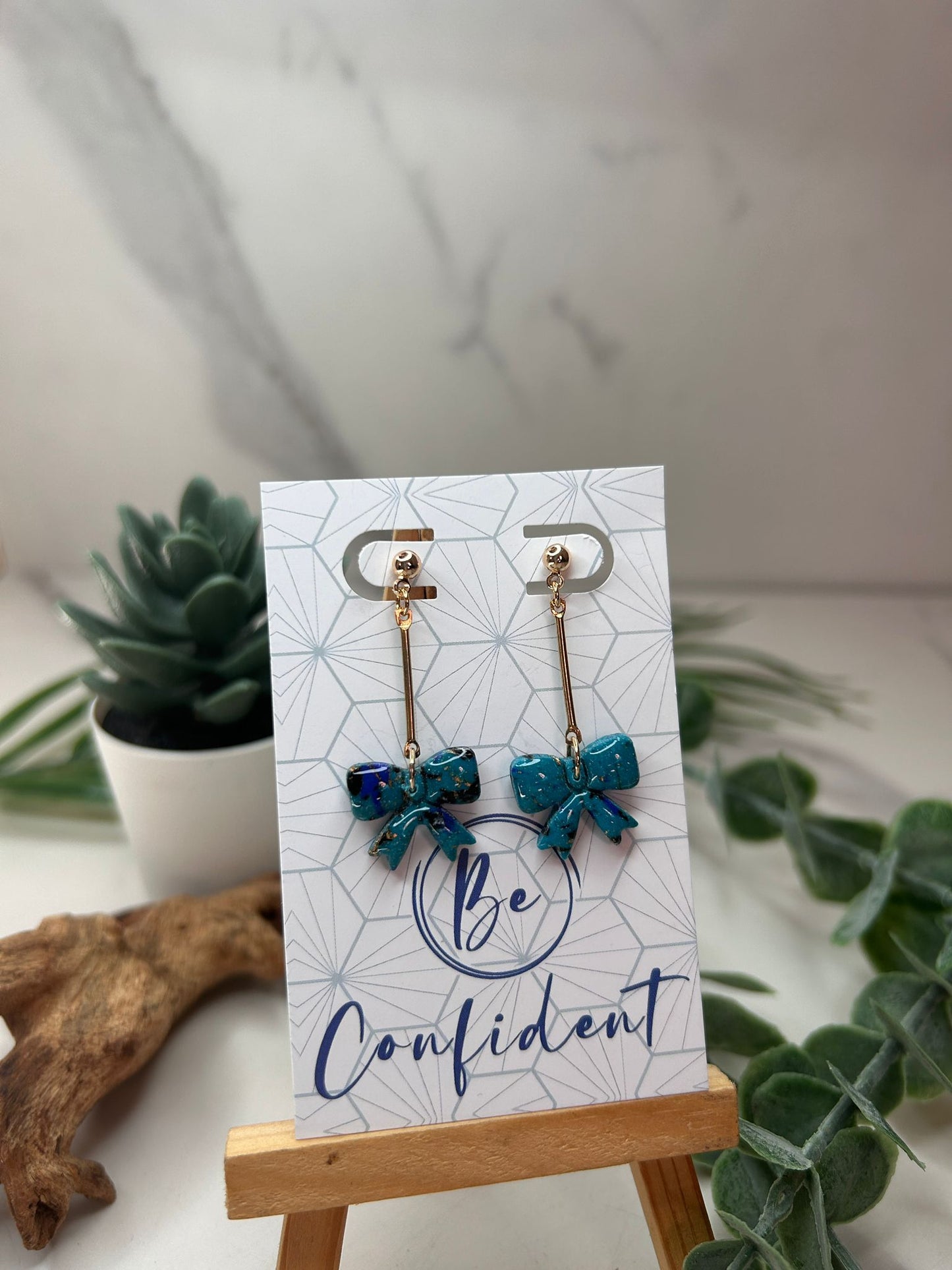 The Bow Stopper Earrings